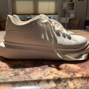 All white AM sneakers